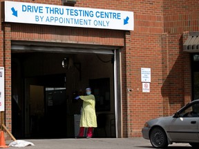 Cars are directed into the drive thru COVID-19 testing centre at the Richmond Road Diagnostic and Treatment centre in Calgary on Tuesday, August 24, 2021. 

Gavin Young/Postmedia
