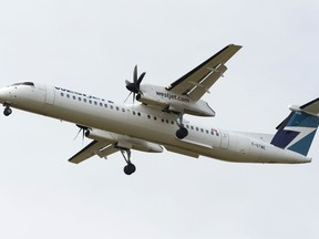 A WestJet Encore Bombardier DHC-8-402 aircraft lands at Edmonton International Airport in this photo from September 2017.