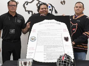 (L-R) Hitmen Vice President Mike Moore, Siksika Health Services CEO Tyler White, Siksika Nation Chief Ouray Crowfoot. The Calgary Hitmen Hockey Club and Siksika Health Services today announced the two parties have signed a first of its kind Memorandum of Understanding (MOU). 

The historic partnership commits to several working goals which will be carried out in the months and years ahead.  Among the pillars is to address stereotypes and racism by advancing inclusion in our communities through the promotion of the Blackfoot culture, language and history.  A second key component is to promote healthy lifestyles for all youth and to highlight the benefits of participation in sport. Calgary Hitman/Candice Ward