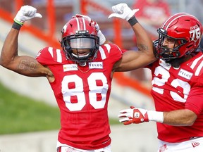 The Calgary Stampeders Kamar Jorden celebrates a TD against the Toronto Argonauts in first half CFL action at McMahon Stadium in this photo from Aug. 7. Photo by Darren Makowichuk/Postmedia