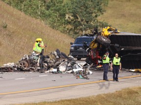 The accident scene on Highway 1 west of Calgary is shown on Aug. 11, 2021. A late morning crash between Calgary and Canmore has left two people dead and westbound lanes closed on the Trans-Canada Highway.