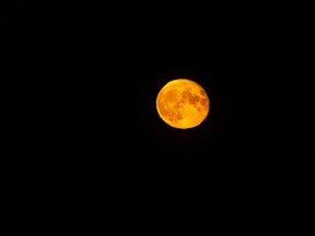 Moonrise over the Belly River near Hill Spring, Ab., on Monday, August 23, 2021.