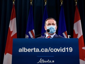 Premier Jason Kenney announces the province's new COVID restrictions at McDougall Centre in Calgary on Friday, September 3, 2021. Azin Ghaffari/Postmedia