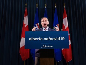 Premier Jason Kenney announces the province's new COVID restrictions at McDougall Centre in Calgary on Friday, September 3, 2021.