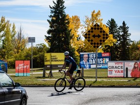 Municipal election signs on 14 St. and 38 Ave. S.W. were photographed on Friday, September 24, 2021.