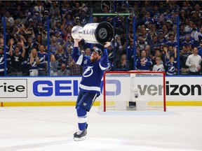 Blake Coleman #20 of the Tampa Bay Lightning celebrates with the Stanley Cup after the 1-0 victory against the Montreal Canadiens in Game Five to win the 2021 NHL Stanley Cup Final at Amalie Arena on July 07, 2021 in Tampa, Florida.