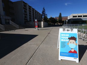 Signs around the SAIT campus in Calgary reminding visitors, staff, students to wear masks are shown on Thursday, September 16, 2021.