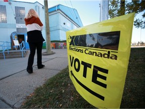 Calgarians vote in the federal election at the Dover Community Centre on Monday, September 20, 2021.