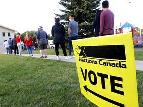 Advance polls at the Renfrew Community Association were around the block in Calgary on Monday, September 13, 2021.