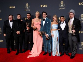 Actors Jeremy Swift, Phil Dunster, Brett Goldstein, Hannah Waddingham, Jason Sudeikis, Juno Temple, Nick Mohammed and Brendan Hunt, cast members of "Ted Lasso", pose for a picture together at the 73rd Primetime Emmy Awards in Los Angeles, U.S., September 19, 2021. REUTERS/Mario Anzuoni