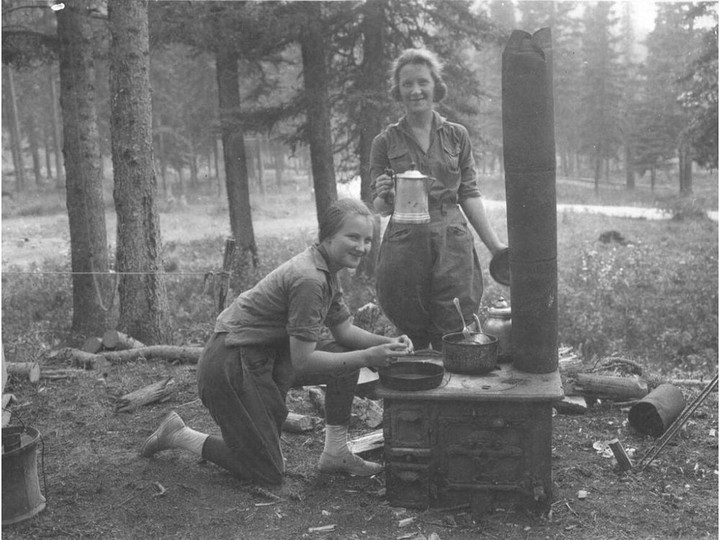  Early automobile campers at Banff making tea over the open fire. Courtesy Whyte Museum of the Canadian Rockies