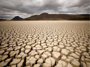 The focus of this election must be the truth that our home is in crisis, says Rev. Natasha Brubaker. Here, clouds gather but produce no rain as cracks are seen in the dried up municipal dam in drought-stricken Graaff-Reinet, South Africa. REUTERS/Mike Hutchings/File Photo
