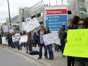Demonstrators, including nurses, protest mandatory vaccinations at Foothills Medical Centre in Calgary on Wednesday, Sept. 1, 2021.