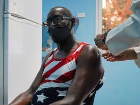 A man is vaccinated at a vaccination center amid concerns about the spread of the coronavirus disease (COVID-19) in Havana, Cuba, June 17, 2021.