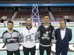 Roughnecks goaltender Christian Del Bianco, forward Dan Taylor, defender Reece Callies and vice-president/governor Mike Moore show off the newly branded team jerseys in Calgary on Wednesday.