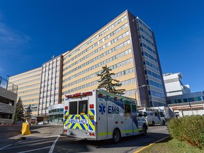 An ambulance proceeds to the emergency entrance of Foothills Hospital on Friday, Sept. 24, 2021.