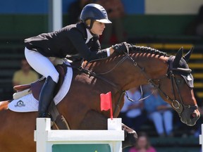 Canada's Tiffany Foster and Brighton came second in the Imperial Winning Round at the Spruce Meadows North American show jumping event on Saturday July 7, 2018.  Gavin Young/Postmedia