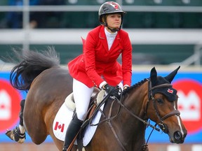 Canada's Tiffany Foster riding Northern Light during the BMO Nations' Cup at the Spruce Meadows Masters in Calgary on Saturday, September 11, 2021. Al Charest / Postmedia