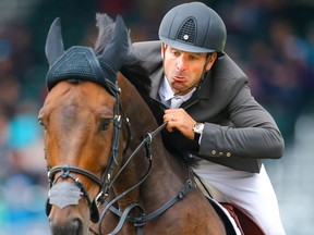 Steve Guerdat of Switzerland wins the CP International competition ridding Venard De Cerisy at the Spruce Meadows Masters in Calgary on Sunday, September 12, 2021. Al Charest / Postmedia