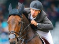 Steve Guerdat of Switzerland wins the CP International competition ridding Venard De Cerisy at the Spruce Meadows Masters in Calgary on Sunday, September 12, 2021. Al Charest / Postmedia