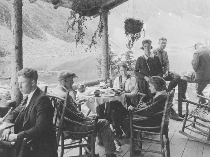  Hikers enjoying tea on the verandah of the Lake Agnes tea house. Courtesy Whyte Museum of the Canadian Rockies