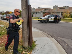 Calgary Police tape off a scene as they investigate a suspicious death inside a house in the 2800 block of 14th Avenue S.E. on Tuesday, October 5, 2021. 

Gavin Young/Postmedia
