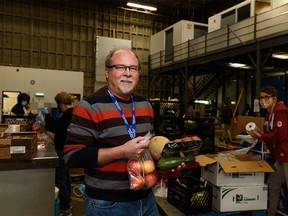 Calgary Food Bank CEO James McAra poses for a photo at the Calgary Food Bank’s warehouse on Thursday, October 28, 2021.