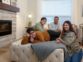 Waleed Asif, 8, Asif Iqbal, Ujala Waqar and Huza Asif, 12, are looking forward to their new home by Shane Homes in the new northwest community of Ambleton.