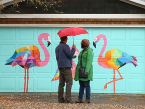 Brother and sister Adam and Camille Lewis pause during a walk through Inglewood in southeast Calgary on Wednesday, October 13, 2021. Camille is visiting from out of town and the pair were enjoying some of Calgary’s sights.