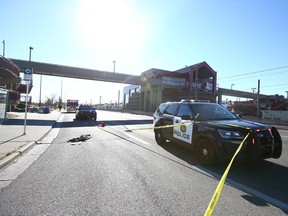 Calgary Police and emergency personnel lock down the scene of a serious stabbing at 36 St and Marlborough Dr / 8 Ave NE, near the Marlborough LRT station in Calgary on Wednesday, October 27, 2021. What is believed to be the victim's clothing is shown on northbound 36 St.