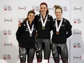 Alberta’s Brooklyn McDougall took first place in the women’s 500 metre long track event followed by Marsha Hudey (Saskatchewan),left, in second and Kaylin Irvine (Alberta) in third at the Canadian Championships at the Olympic Oval in Calgary on Wednesday, October 13, 2021. Gavin Young/Postmedia