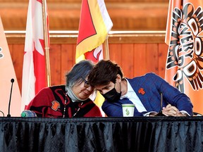 Canada's Prime Minister Justin Trudeau and National Chief of the Assembly of First Nations RoseAnne Archibald at the Tk'emlups PowWow Arbour in Kamloops, British Columbia, Canada, October 18, 2021.