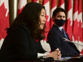 Minister of Small Business, Export Promotion and International Trade Mary Ng talks as Prime Minister Justin Trudeau looks on as they provide an update during the COVID pandemic in Ottawa on Tuesday, Nov. 3, 2020.