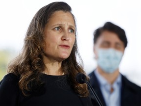 Canada's Deputy Prime Minister and Minister of Finance Chrystia Freeland and Prime Minister Justin Trudeau take part in a news conference outside the Children's Hospital of Eastern Ontario in Ottawa, Canada October 21, 2021.