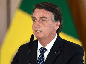 Brazilian President Jair Bolsonaro was guided "by an unfounded belief in the theory of herd immunity by natural infection and the existence of a (COVID-19) treatment," according to a Senate report.