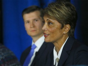 Candidates Jeromy Farkas and Jyoti Gondek participate in a mayoral debate in Calgary on Wednesday, Oct. 6, 2021.