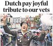 Canadian veteran Sam Wormington, of Kamloops, BC, celebrates with the crowd during a May 8, 2005 VE-Day parade in Apeldoorn, Netherlands.  Canadian Press.