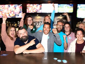Ward 12 city council elect Evan Spencer (grey sweater) celebrates with supporters at The Tommyfield Gastro Pub in the SE. Monday, October 18, 2021.