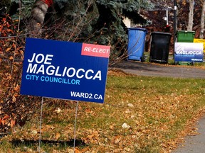 Election signs for Ward 2 candidate Joe Magliocca are shown in the northwest community of Hawkwood. Magliocca has been charged with fraud and breach of trust after an RCMP investigation into his expenses. Friday, October 8, 2021.