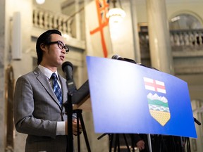 Thomas Dang, the NDP’s deputy house leader, calls for mandatory vaccinations for MLAs during a press conference at the Alberta Legislature in Edmonton, on Friday, Oct. 1, 2021.