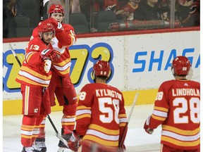 The Calgary Flames’ Johnny Gaudreau celebrates scoring a goal against the Vancouver Canucks during a preseason game at the Saddledome on Friday, Oct. 1, 2021.