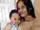 Jasmine Lovett holds her daughter, Aliyah, in an undated family photo.