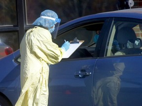 A steady steam of vehicles pulled into the Richmond Road Diagnostic and Treatment Centre throughout the afternoon for COVID tests in Calgary on Monday, October 4, 2021. Darren Makowichuk/Postmedia