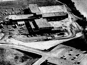 This month in local history, Rockyview Hospital opened in 1966. In this photo from the Calgary Herald on Oct. 4, 1966, workmen were putting the finishing touches on the then-$3.5-million hospital. An additional $1 million-plus was spent to equip the hospital. Here, the painted lines of the paved parking lot can be seen at the top of the photo. The hospital initially opened 80 of its 200 beds on Nov. 1. The bottom of the photo shows a portion of the 200-bed Glenmore Auxiliary Hospital, which opened in 1964 to care for long-term patients. Glenmore reservoir is at the right. Calgary Herald archives.