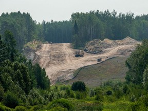 In this file photo taken on August 7, 2021 sections of the Enbridge Line 3 pipeline are seen on the construction site near La Salle Lake State Park in Solway, Minnesota.