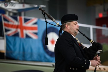 Andrew Smith plays Flowers of the Forest at the Remembrance Day ceremony at the museum on Thursday, November 11, 2021. Azin Ghaffari/Postmedia