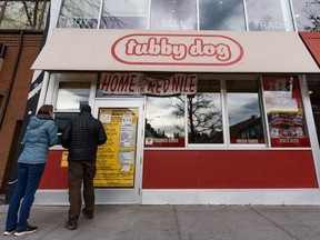 Customers enter Tubby Dog on 17th Ave. on Friday, November 12, 2021.