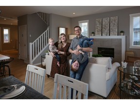 Kierra and Nick Irvine, with their children Thomas, 1, and Bennett, 3. They love the ravines and views that the new community of Hudson at Creekstone.