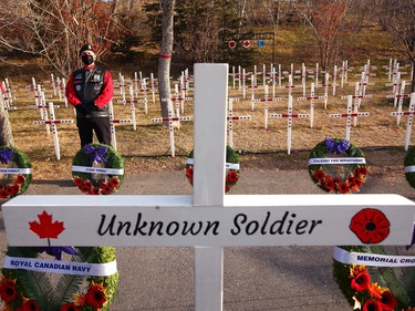 A veteran stands in preparation for Remembrance Day ceremonies at the Field of Crosses on Memorial Drive in northwest Calgary on Thursday, November 11, 2021. Jim Wells/Postmedia