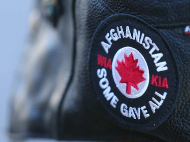 A patch is shown on a leather vest worn by veteran Tom MacCarl, who served in Cyprus and Europe (Royal Canadian Electrical and Mechanical Engineers) during Remembrance Day ceremonies at the Field of Crosses on Memorial Drive in northwest Calgary on Thursday, November 11, 2021. Jim Wells/Postmedia
